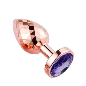 Plug anal rosy gold taille M avec bijou violet scintillant, pour plaisir raffiné et stimulation sensuelle